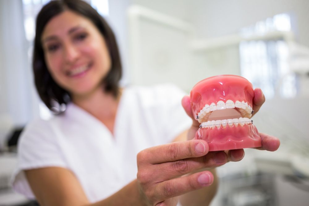 How Do You Maintain Dental Implants And Dentures?