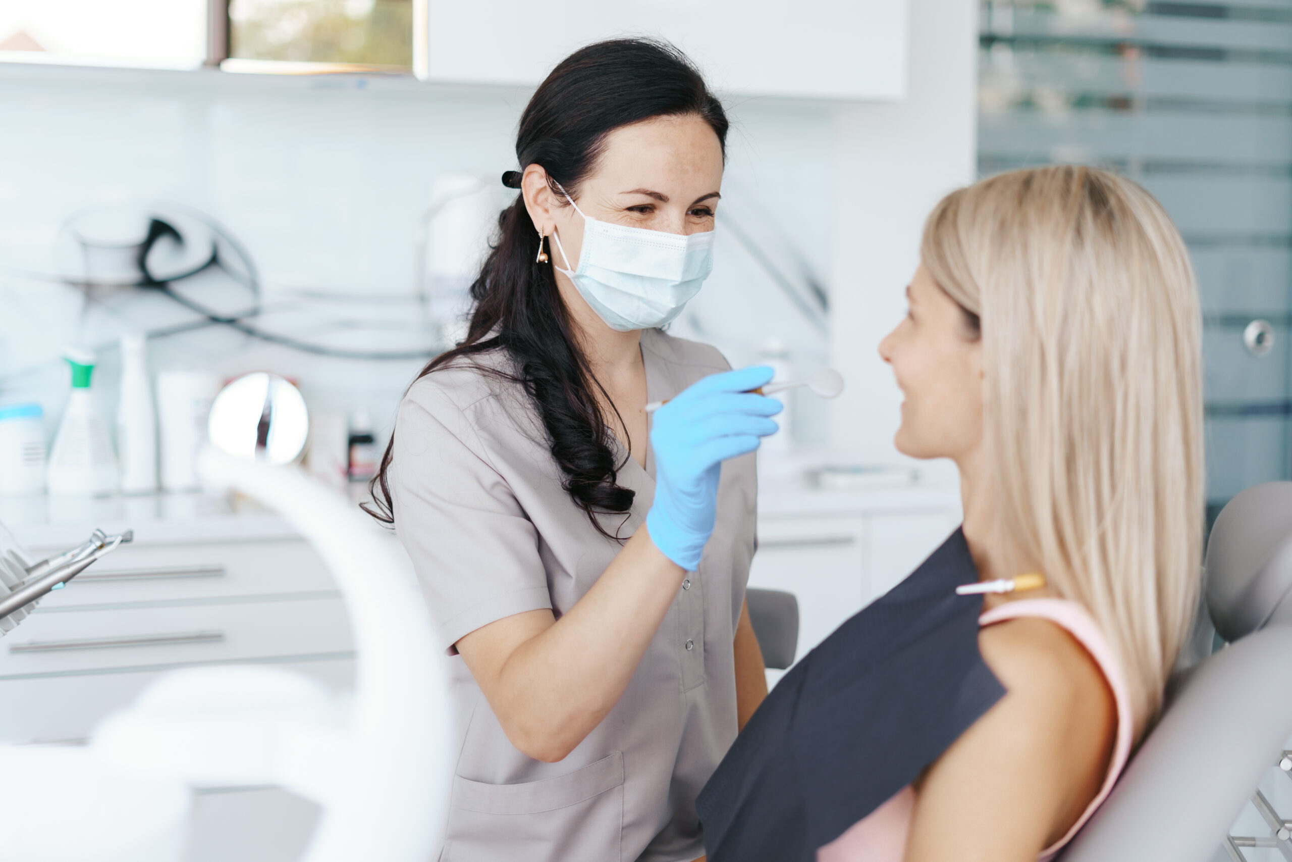 talk between dentist and her patient