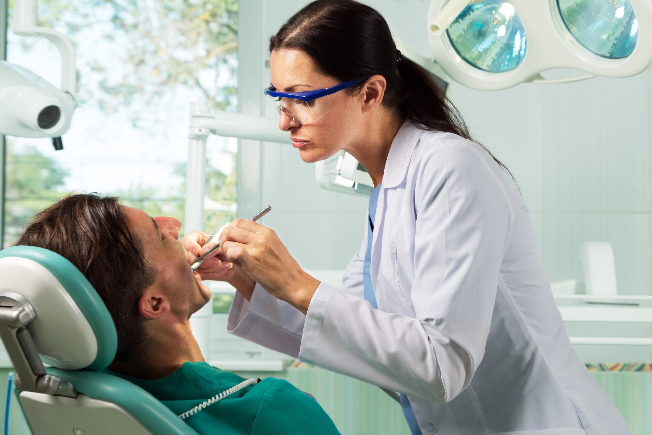 close up of a dentist working on patient